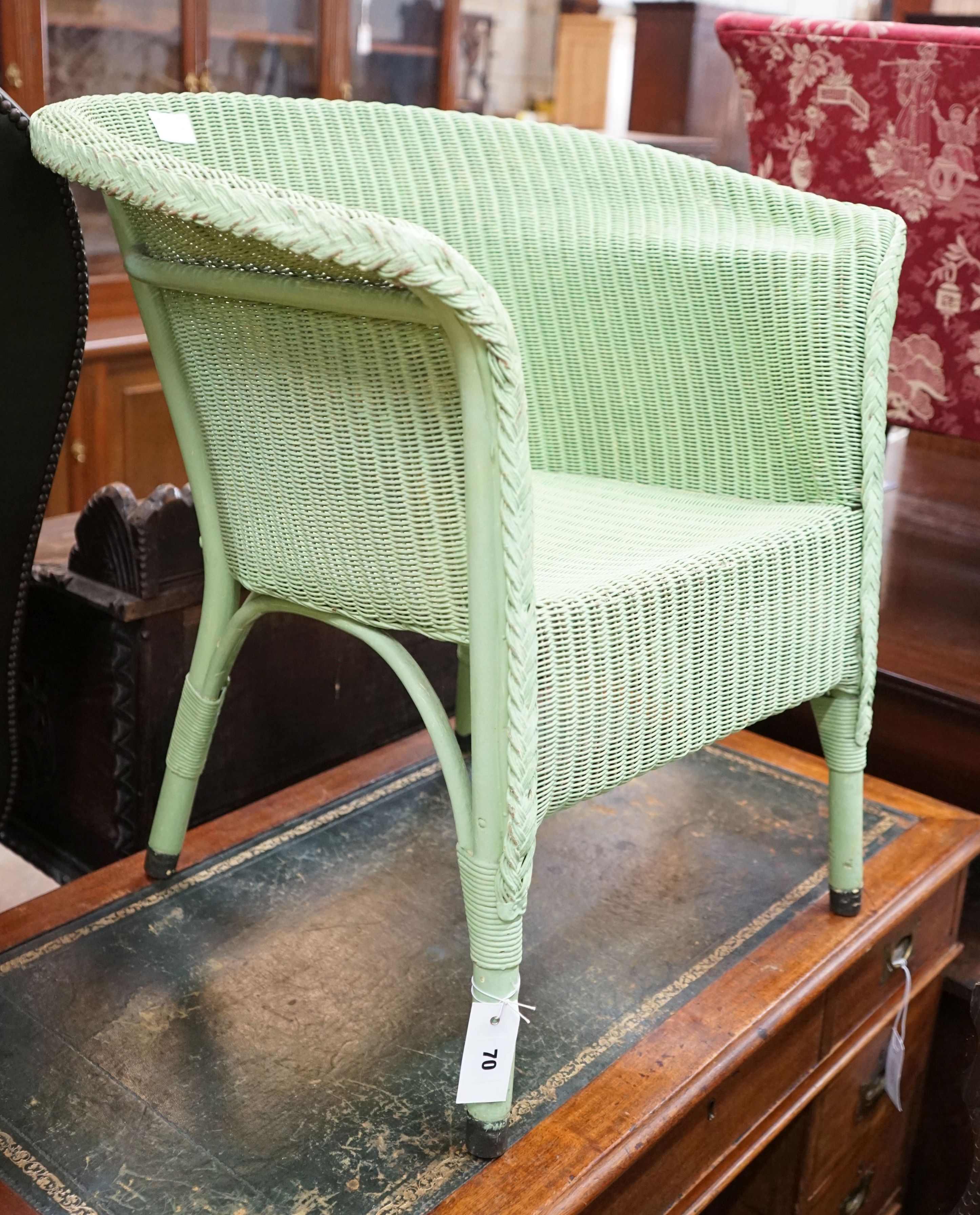 A Lloyd Loom elbow chair, later painted